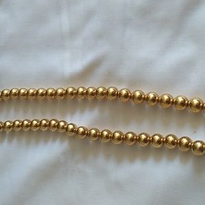 A NWOB NAPIER GOLD BALLS NECKLACE IN EXCELLENT CONDITION. APPROX 18" SB.29